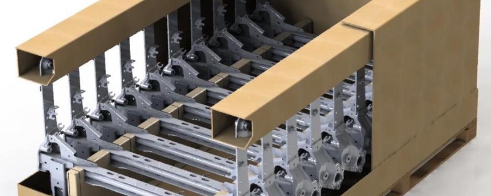 The fibre-based packaging is designed to replace metal containers in the transport of automotive chassis components. Photo: DS Smith Tecnicarton