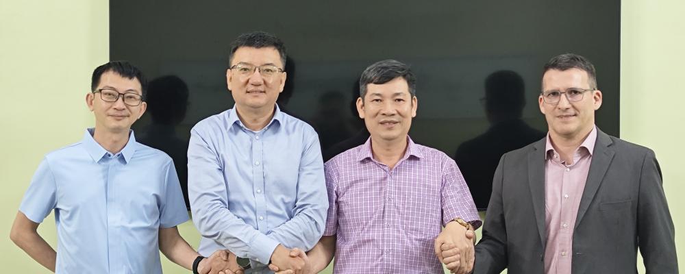 Left to right: Rencheng Mao, Engineer, GDT; Hanson Zhao, Vice President Sales, Voith Paper Asia; Dinh Nhu Kien, Chairman of the Board of Directors, GDT; and Ronaldo Parucker, Senior Vice President Business Development, Voith Paper SEA. Photo: Voith