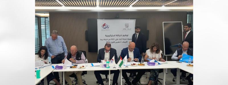 Tarek Aggad, Chairman & CEO of APIC signing the acquisition agreement with Reema shareholders: Nabil and Omar Alhaj Abed, Jadallah Jadallah, and Al Hur investments Co. represented by Lana Alhaj Abed and Nadine Issa. Photo: PRNewsfoto/APIC