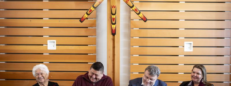 Tla’amin Nation and Domtar sign the tiskwat land agreement in Powell River, BC. From left to right: Elsie Paul, Tla’amin Elder; Hegus John Hackett, Tla’amin Nation; Richard Tremblay, President, Pulp and Tissue, Domtar; and Lana Wilhelm, Director, Indigenous Relations, Domtar. The agreement sees a significant portion of the tiskwat paper mill site lands returning to the Tla’amin Nation. Photo: CNW Group/Domtar