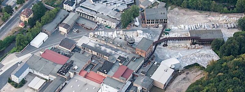 Aerial view of the paper mill in Hainsberg, Saxony. Photo: Screenshot. Credit: Papierfabrik Hainsberg.