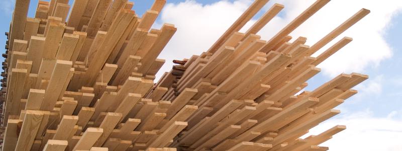 Sawn timber stacked in lumber piles. Photo: Wikipedia Commons Lic. Credit: Kotivalo