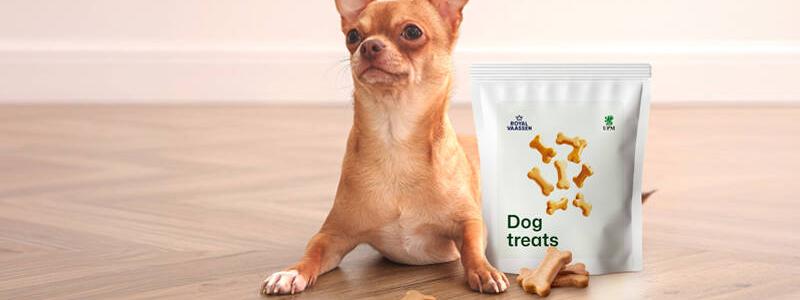Pet treats are often oily and aromatic and have traditionally relied on plastic or aluminum laminates or papers with PFAS-based grease barrier. Photo: UPM