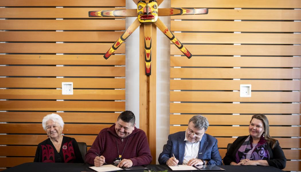 Tla’amin Nation and Domtar sign the tiskwat land agreement in Powell River, BC. From left to right: Elsie Paul, Tla’amin Elder; Hegus John Hackett, Tla’amin Nation; Richard Tremblay, President, Pulp and Tissue, Domtar; and Lana Wilhelm, Director, Indigenous Relations, Domtar. The agreement sees a significant portion of the tiskwat paper mill site lands returning to the Tla’amin Nation. Photo: CNW Group/Domtar