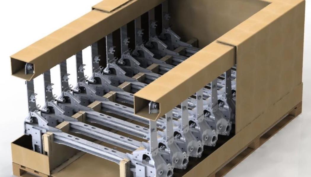 The fibre-based packaging is designed to replace metal containers in the transport of automotive chassis components. Photo: DS Smith Tecnicarton