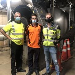 Matthew Bain, Project Manager, Essity AustralAsia (in the middle) pictured with Runtech Systems start-up team Hannu Kääriä, Sales Director, APAC, (left) and Toni Raja, Project Manager, in front of the new EP600 Turbo Blower.