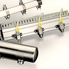 Technical solutions such as clean-out needles and specialised nozzles that prevent buildup can help maintain stable spray patterns during extended paper machine runs. Image: Spraying Systems Co.
