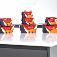 Cascades will offer more sustainable alternatives for hard-to-recycle packaging with a brand new line of produce baskets with flaps. Photo: CNW Group/Cascades Inc.