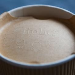 Liplid's uniqe lid, adapted to PulPac's innovative Dry Molded Fiber technology, enables MAX Burgers to replace plastic coffee lids in restaurants this year. Photo: PulPac