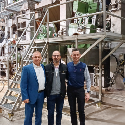 KMK Paper and Toscotec’s team in front of  PM1 at Kahramanmaraş mill in Turkey (from left to right): Bora Kallem, owner,  
EMKA Ltd; Cihangir Hakan Oba, Project Manager, KMK Paper; Fabrizio Charrier, Sales Manager, Toscotec. Photo: Toscotec