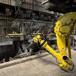 Smelt spout robot in action. Photo: Business Wire