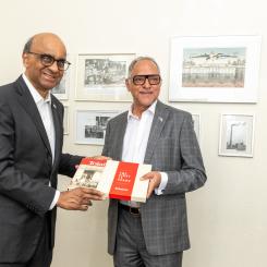 President of Singapore Tharman Shanmugaratnam receives Tolaram's 75th anniversary book from Sonny Aswani, Chairman of the Supervisory Board of Horizon Pulp and Paper Ltd.  Photo: Sven Tupits